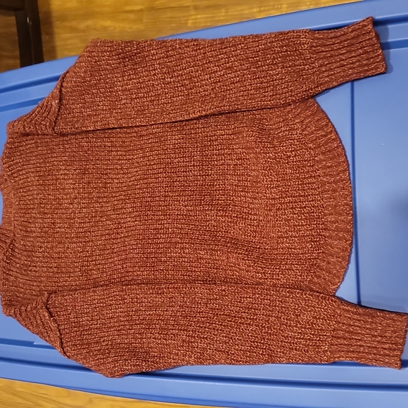 A sweater, yarn like material thick so cold weather won't get in. - Picture 2 of 2